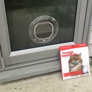 CatWalk G-CDC cat door (clear) installed in glass